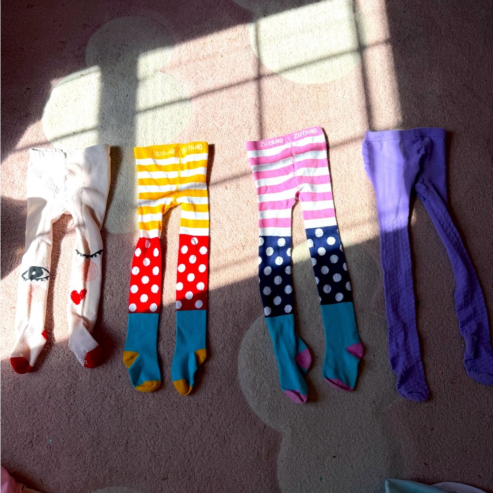 Gently used fun girls toddler tights